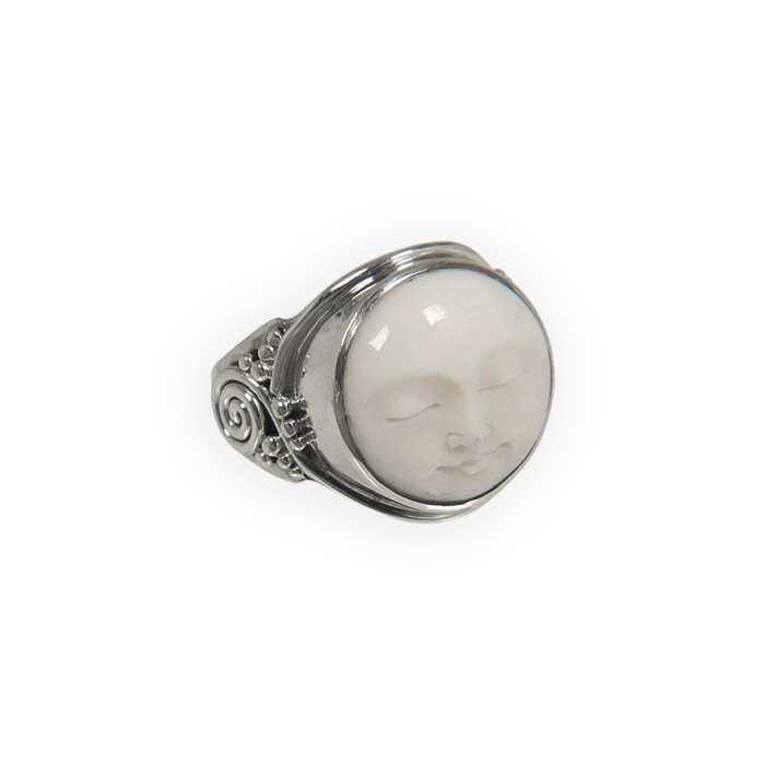 silver ring with a moon face bone pendant