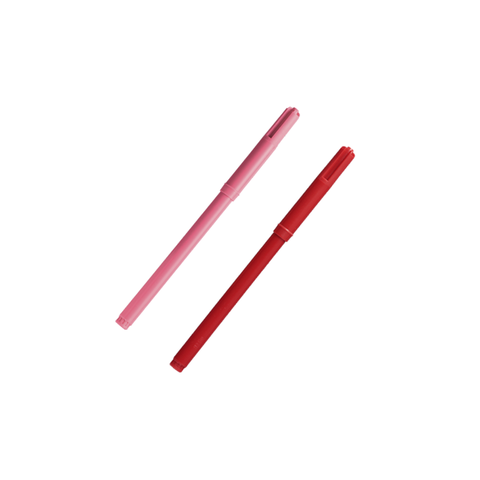 pink and red pen with cap