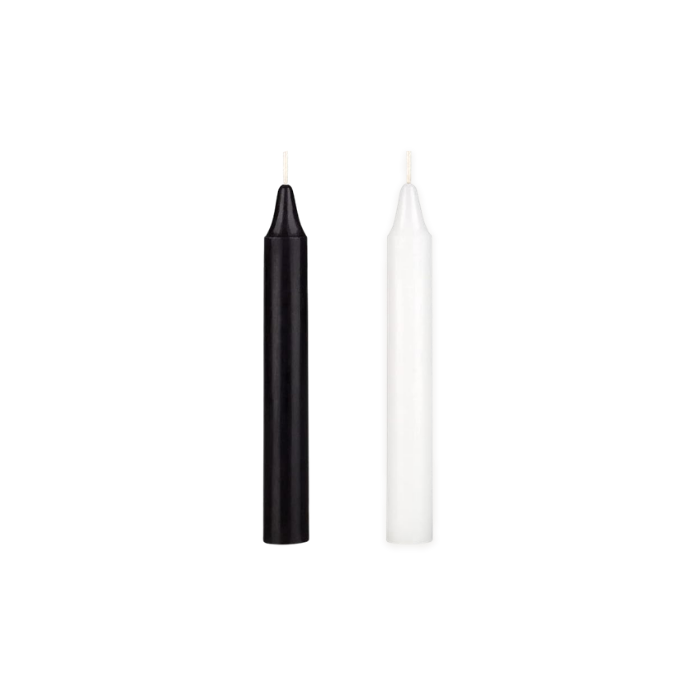unlit black and white chime candle stand side by side